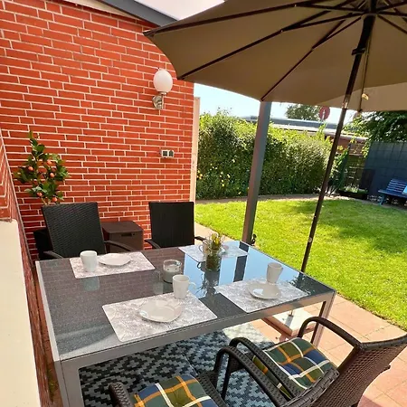 Ferienhaus Dackel am Deich - strandnah - eingezäunter Garten - Ruhe Dornumersiel